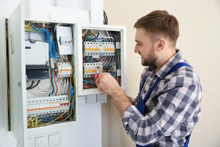 Local electrician working on a consumer unit in Coventry