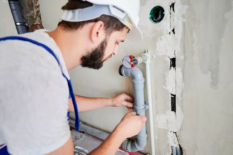 Local plumber isolating a valve near Hereford